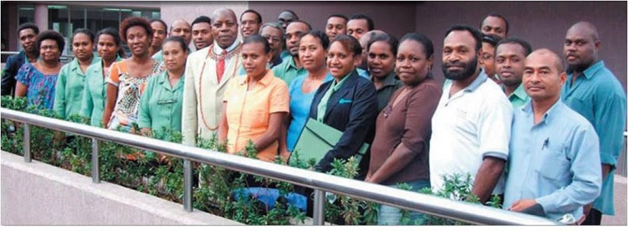 Mr Ngwasiri (Khaki suit) in Papua New Guinea